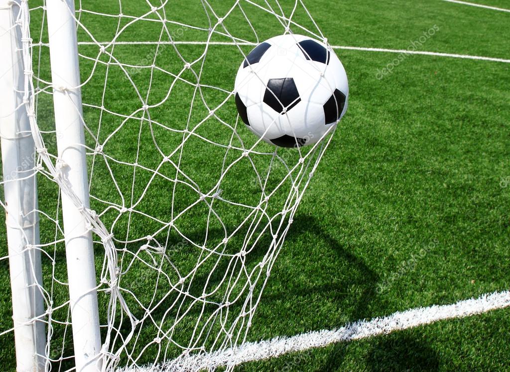 depositphotos 36021779 stock photo soccer football in goal net